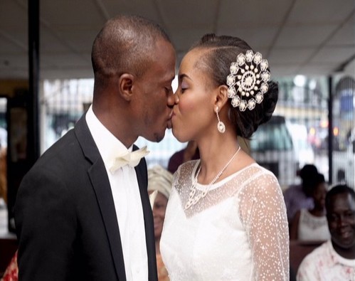 picture couple kissing white wedding nigeria