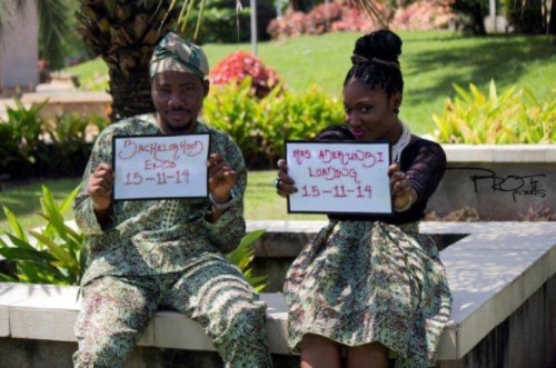 picture of nigerian couple flashing their 'save the wedding date'