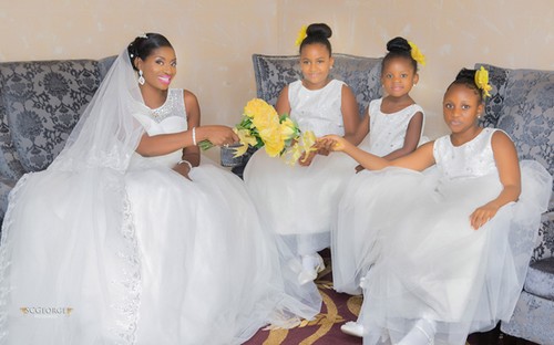 picture of flower girls with bride and yellow bouquet
