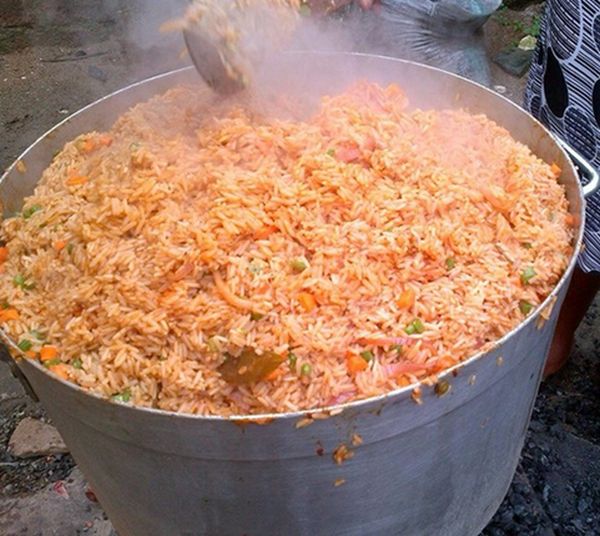 pot of party jollof rice cooking picture