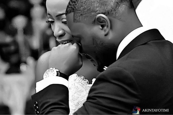 image: groom and bride in a teary moment