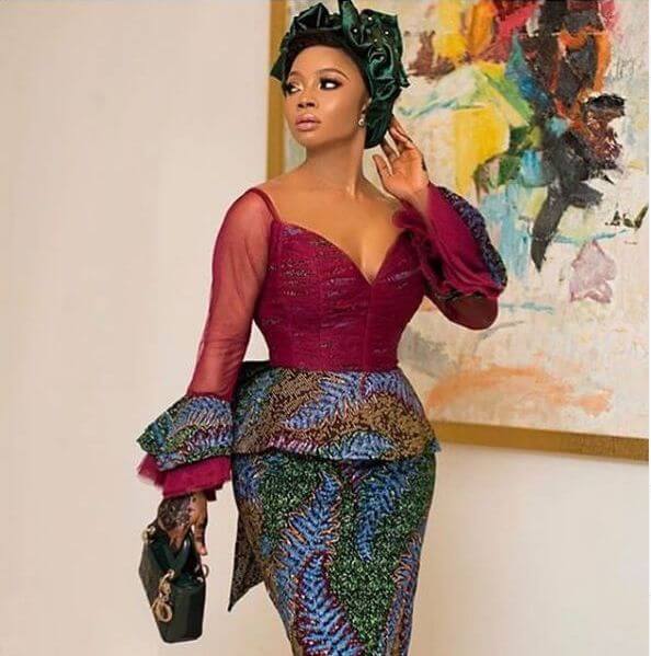 ankara peplum dress with sweetheart neckline n funnel sleeves