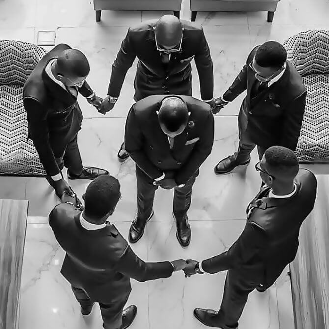 groomsmen prayer circle for groom nigeria