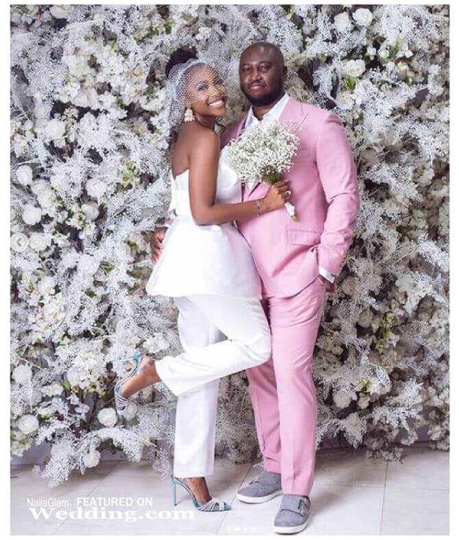 white bridal suit n pink mens suit - Ini Dima court wedding